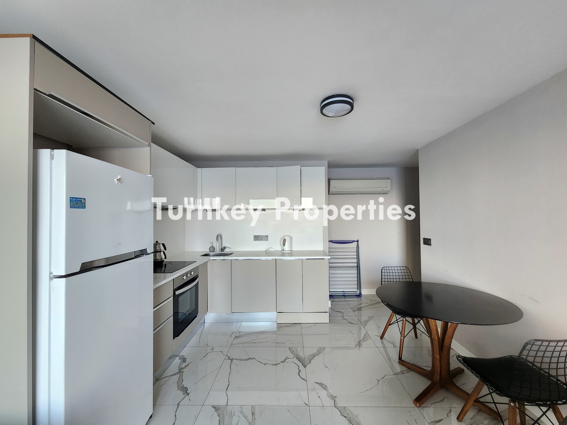 Gümüşlük Koyunbaba’da Deniz Manzaralı Satılık Daire Denize Sıfır