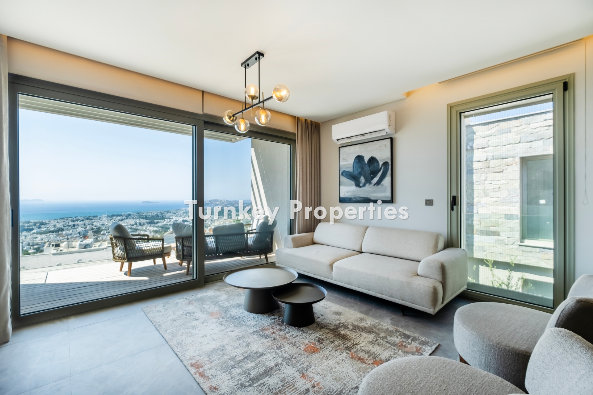 2+1 Apartment for Sale in Turgutreis with Marina and Kalymnos Views | Shared Pool, Underfloor Heating, Water Tank, and Generator Facilities