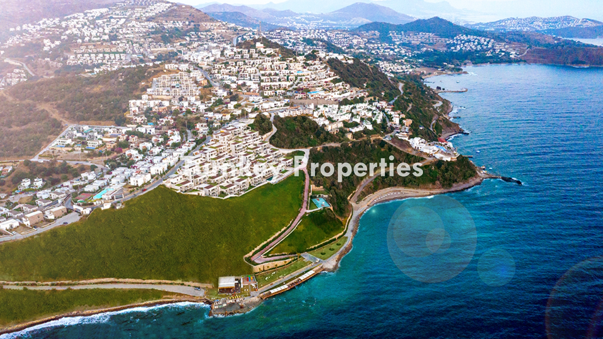 Gümüşlük Koyunbaba’da Deniz Manzaralı Satılık Daire Denize Sıfır