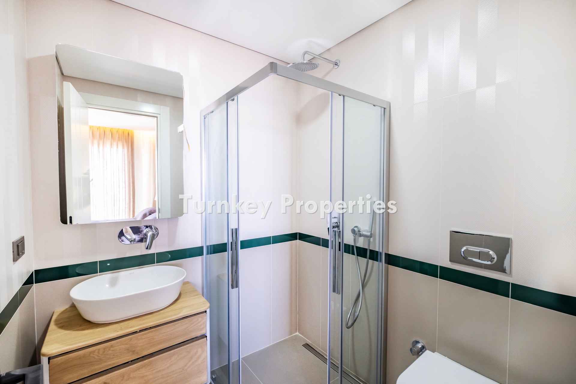 2+1 Apartment for Sale in Turgutreis with Marina and Kalymnos Views | Shared Pool, Underfloor Heating, Water Tank, and Generator Facilities