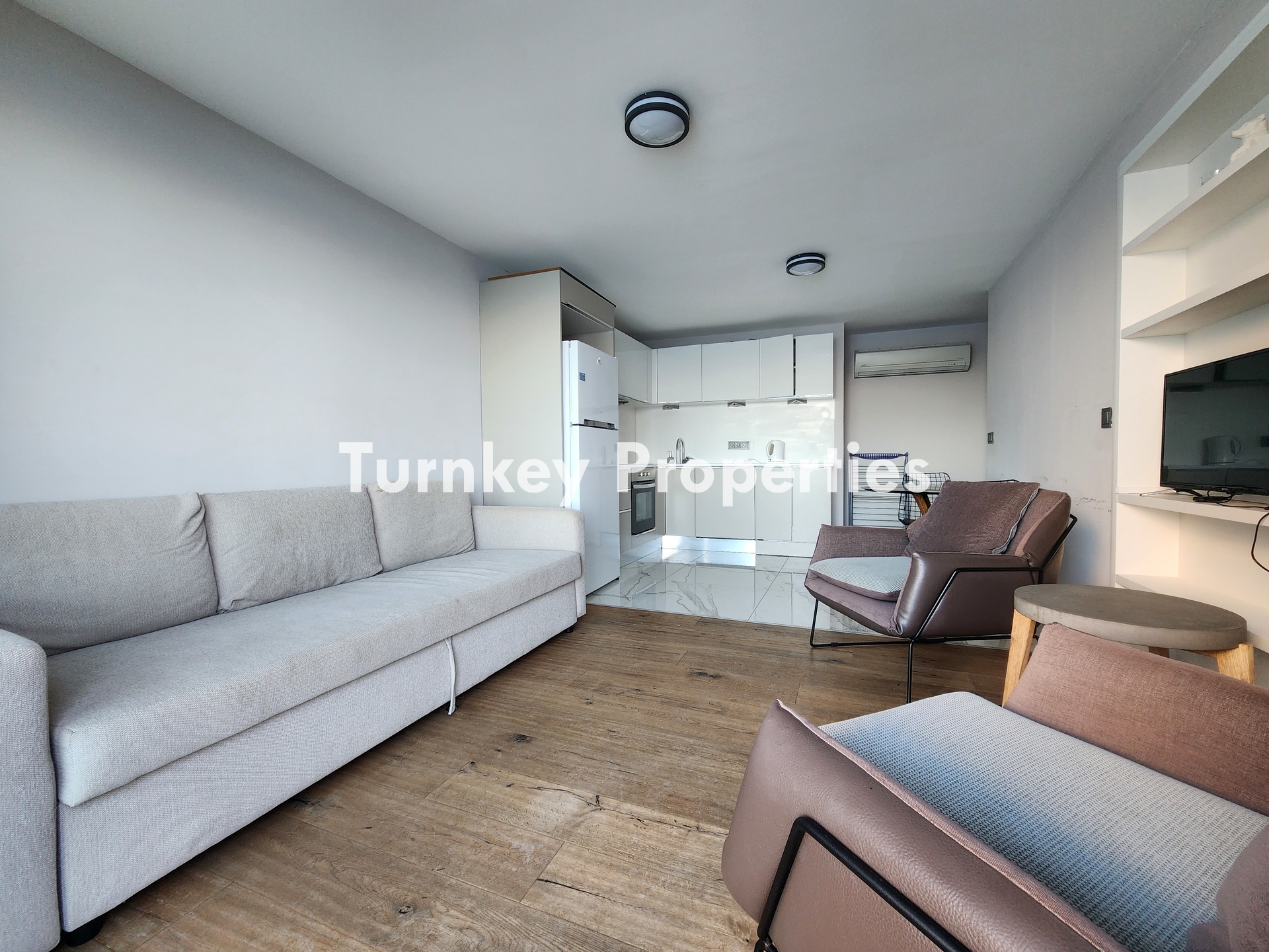 Gümüşlük Koyunbaba’da Deniz Manzaralı Satılık Daire Denize Sıfır